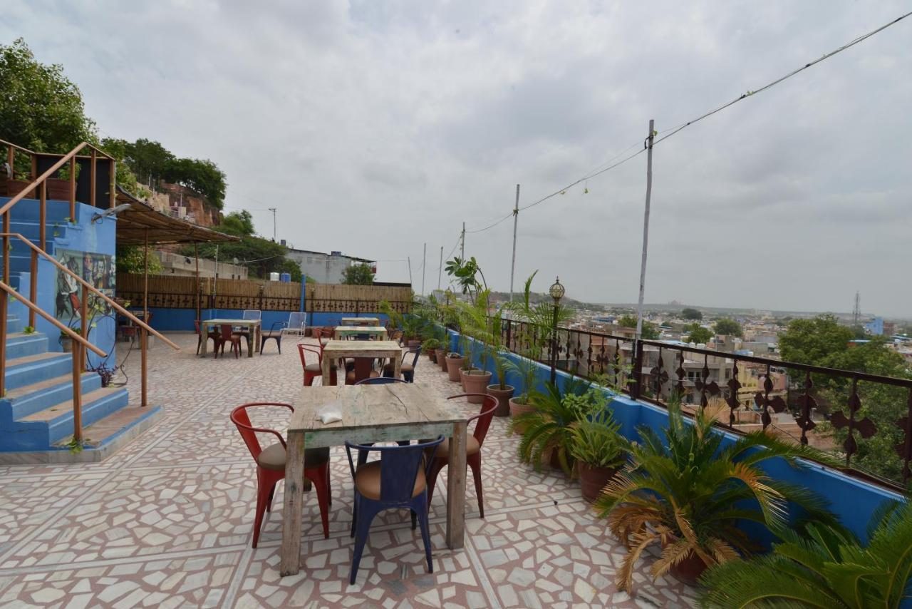 Rooftop seating with Blue City views